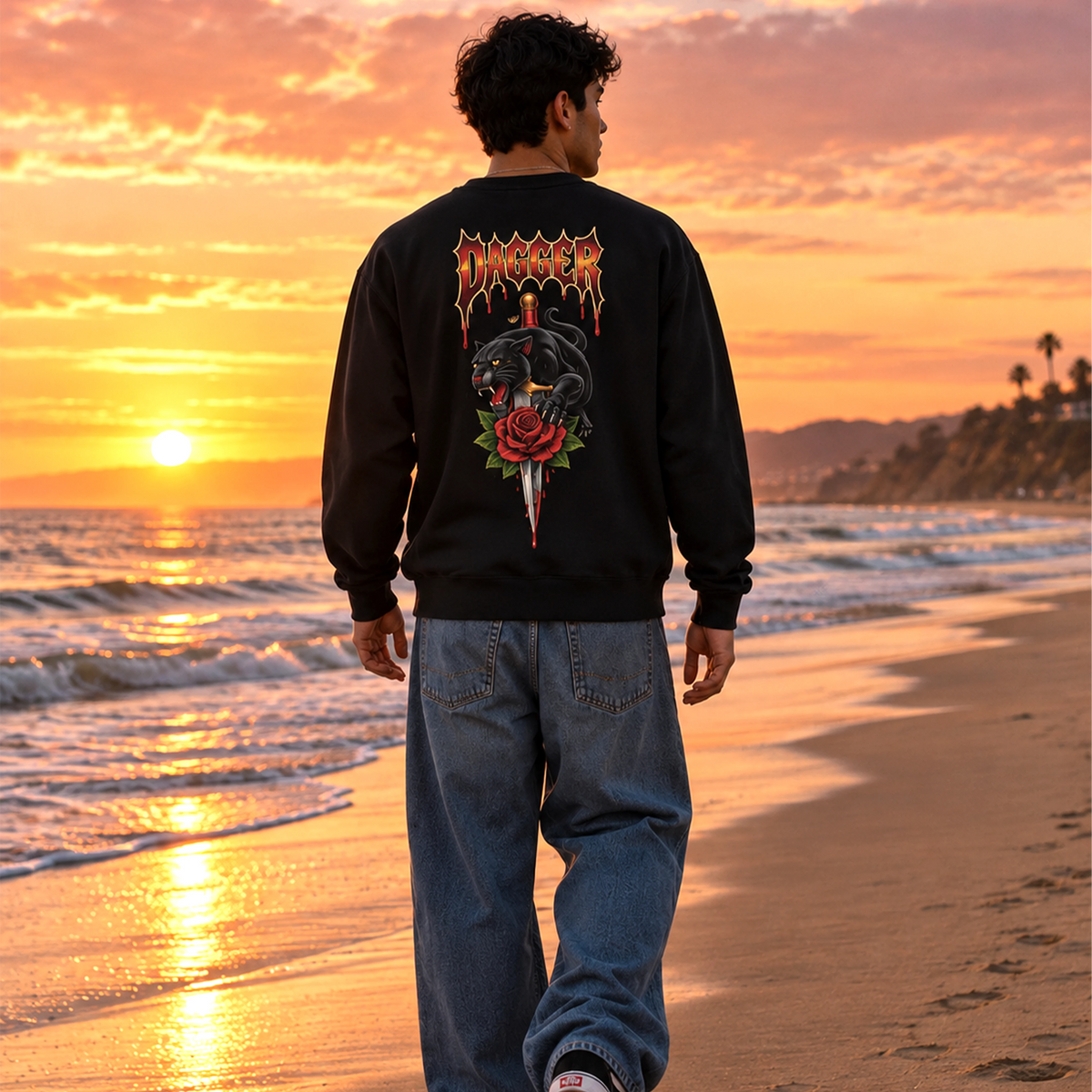 Dagger Panther Rose crewneck back graphic worn on the beach at sunset